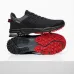 Кросівки чоловічі великих розмірів чорні з червоною підошвою (сітка)