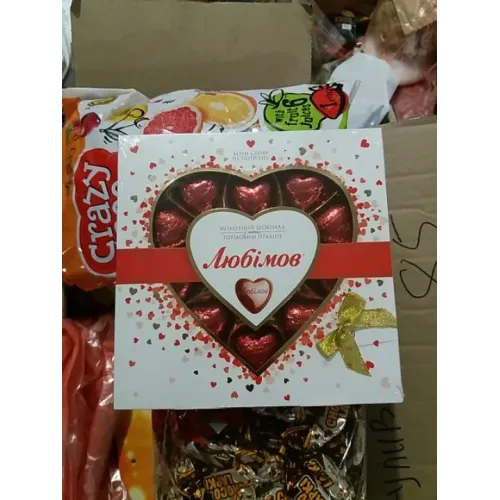 Цукерки Любимов молочний шоколад з нижнім горіховою начинкою 125 гр