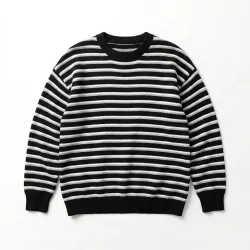 Жіночий светр у смужку оверсайз. В'язаний джемпер тільняшка чорно-білий